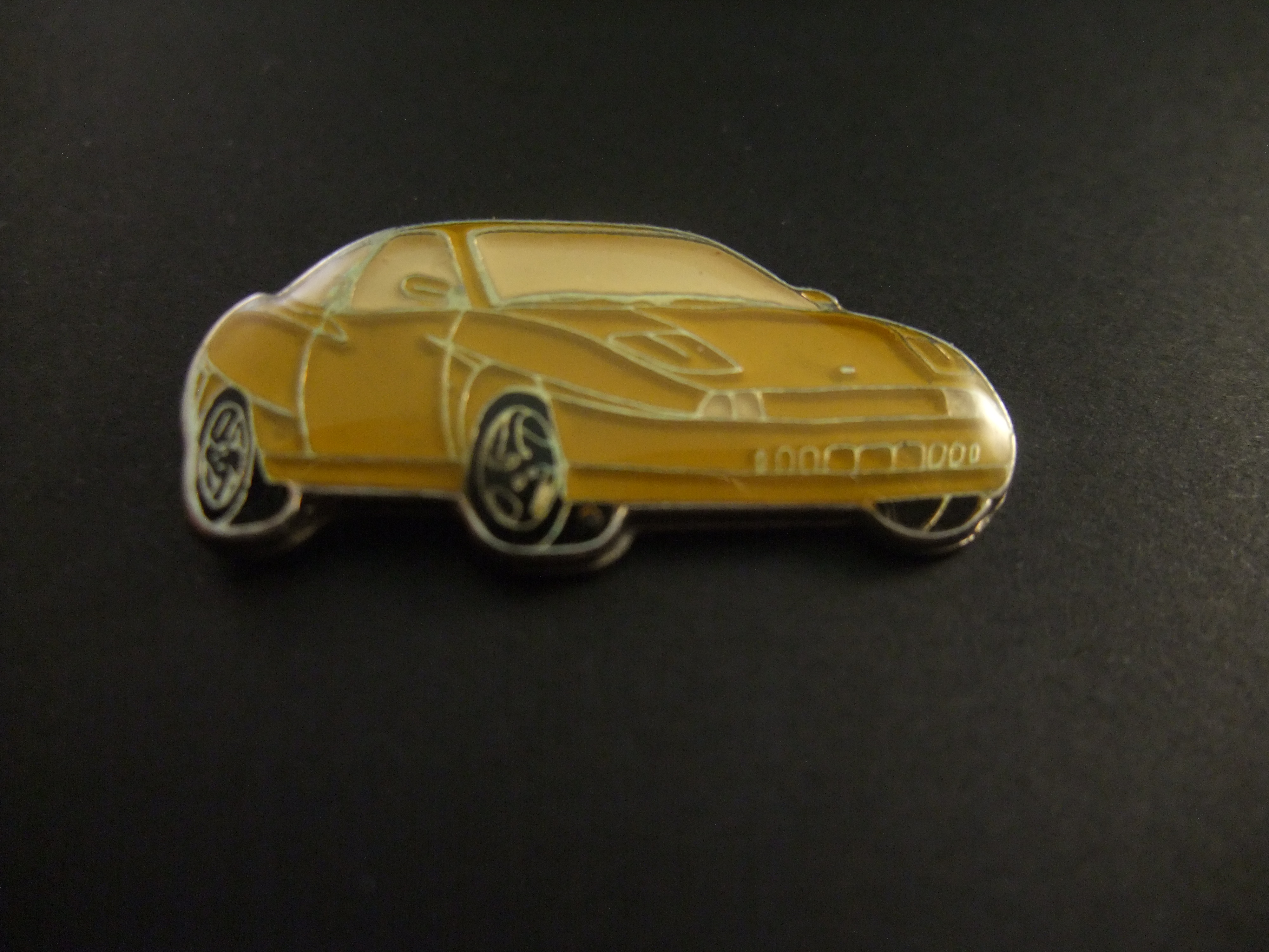 Fiat coupé sportwagen 1996 - 2000 geel ( zwarte carrosserie)